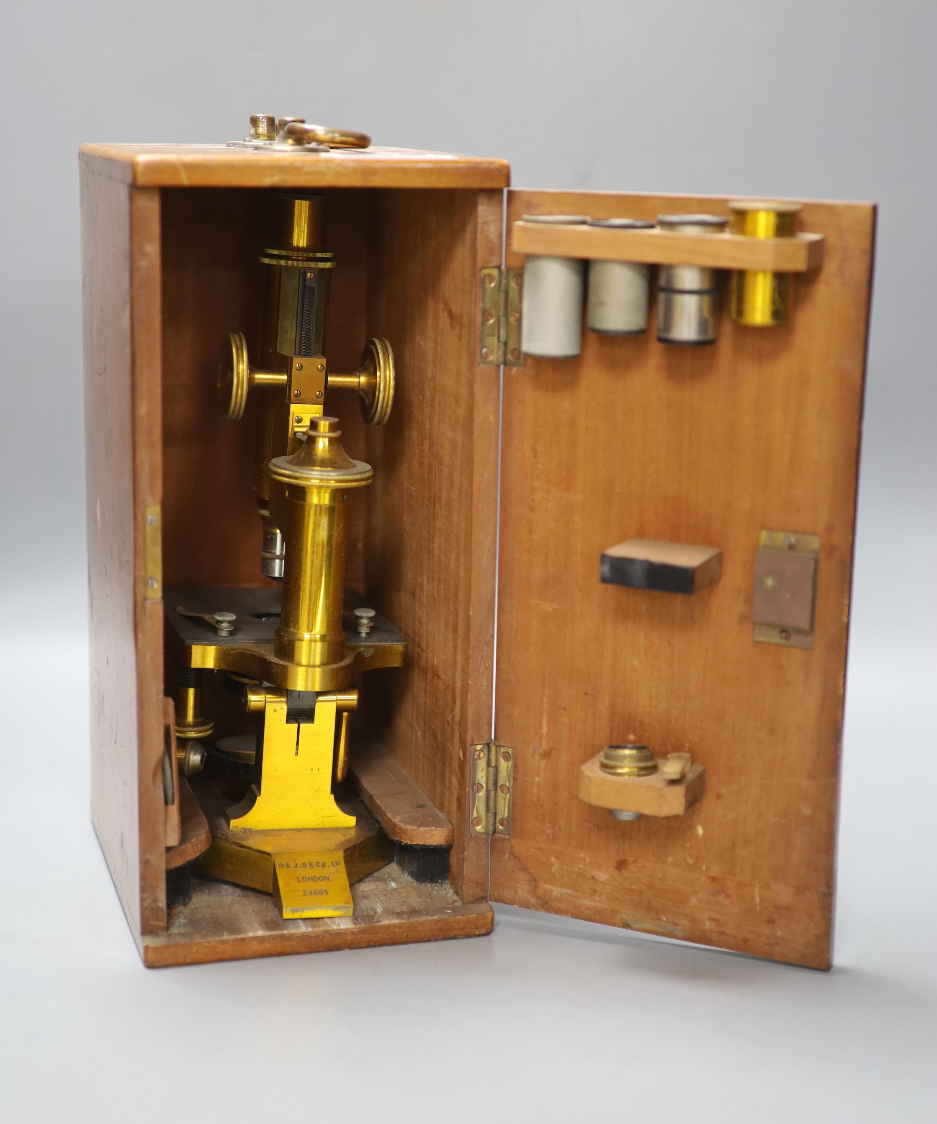 An R & J Beck Ltd brass microscope in case, serial no. 24889